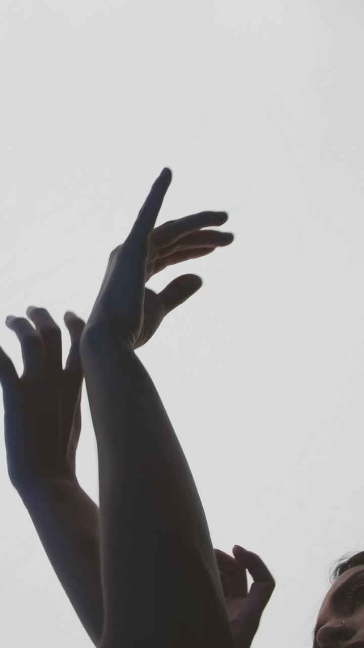 Download Stock Video Contemporary Dancers Hands On A Light Background Live Wallpaper For PC