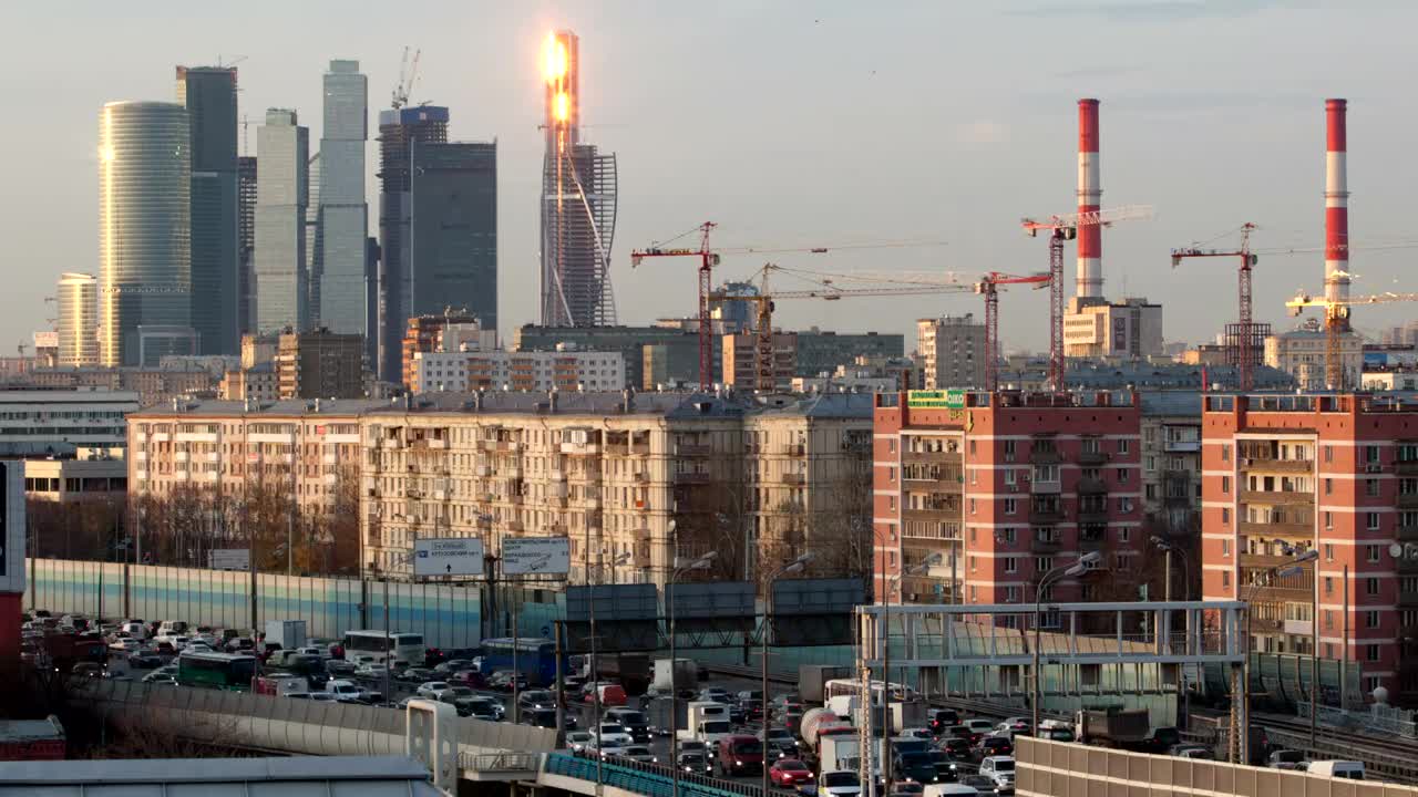 Download Stock Video Construction Cranes Moving In The Distance Live Wallpaper For PC