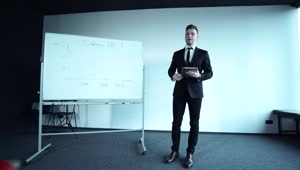 Stock Video Confident Young Businessman Doing A Presentation Live Wallpaper For PC