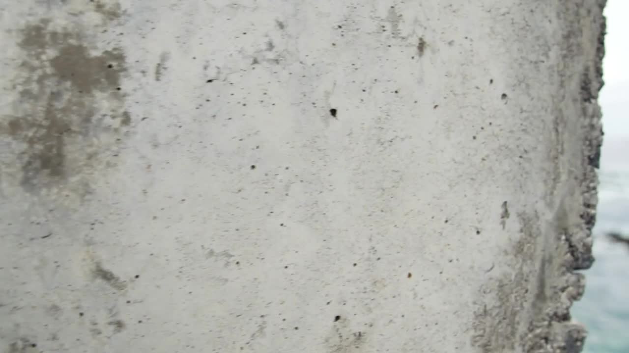 Download Stock Video Concrete Texture And Beach View With Rocks Live Wallpaper For PC