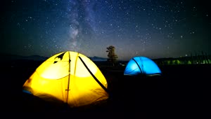 Stock Video Colorful Lit Tents With Time Lapse Of Night Sky And Live Wallpaper For PC