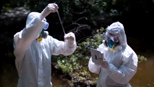 Stock Video Collecting Water Samples In Biohazard Suits Live Wallpaper For PC