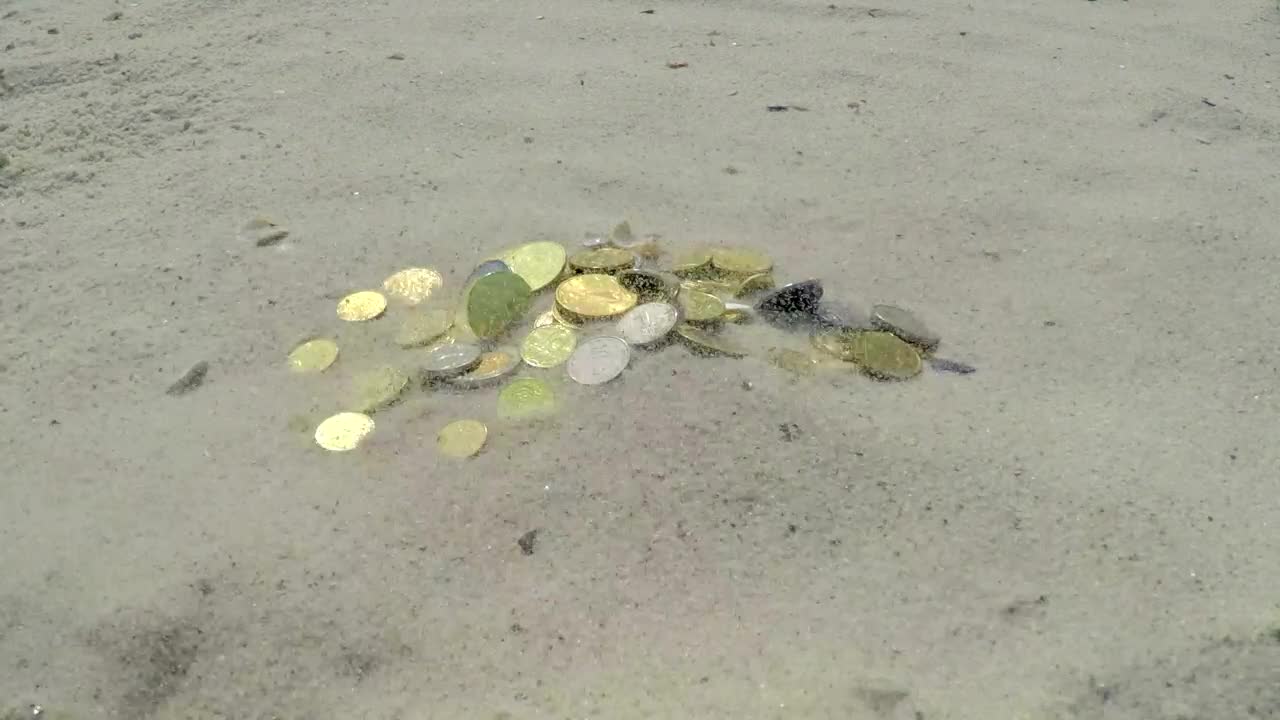 Download Stock Video Coins Buried In The Sand Live Wallpaper For PC
