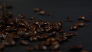 Stock Video Coffee Beans Falling Onto A Dark Cloth Live Wallpaper For PC