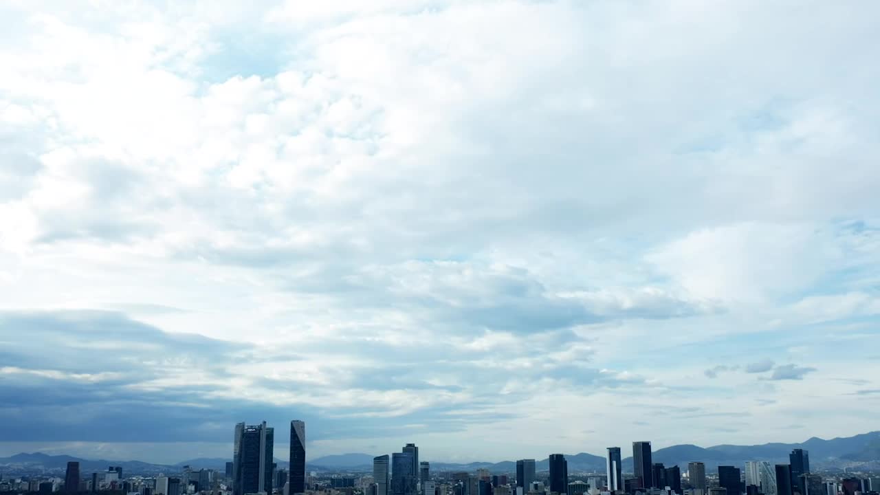 Download Stock Video Cloudy Sky Over A Contemporary City Live Wallpaper For PC