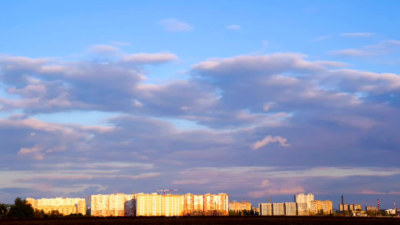 Download Stock Video Clouds Traveling Over A City At Dusk Live Wallpaper For PC