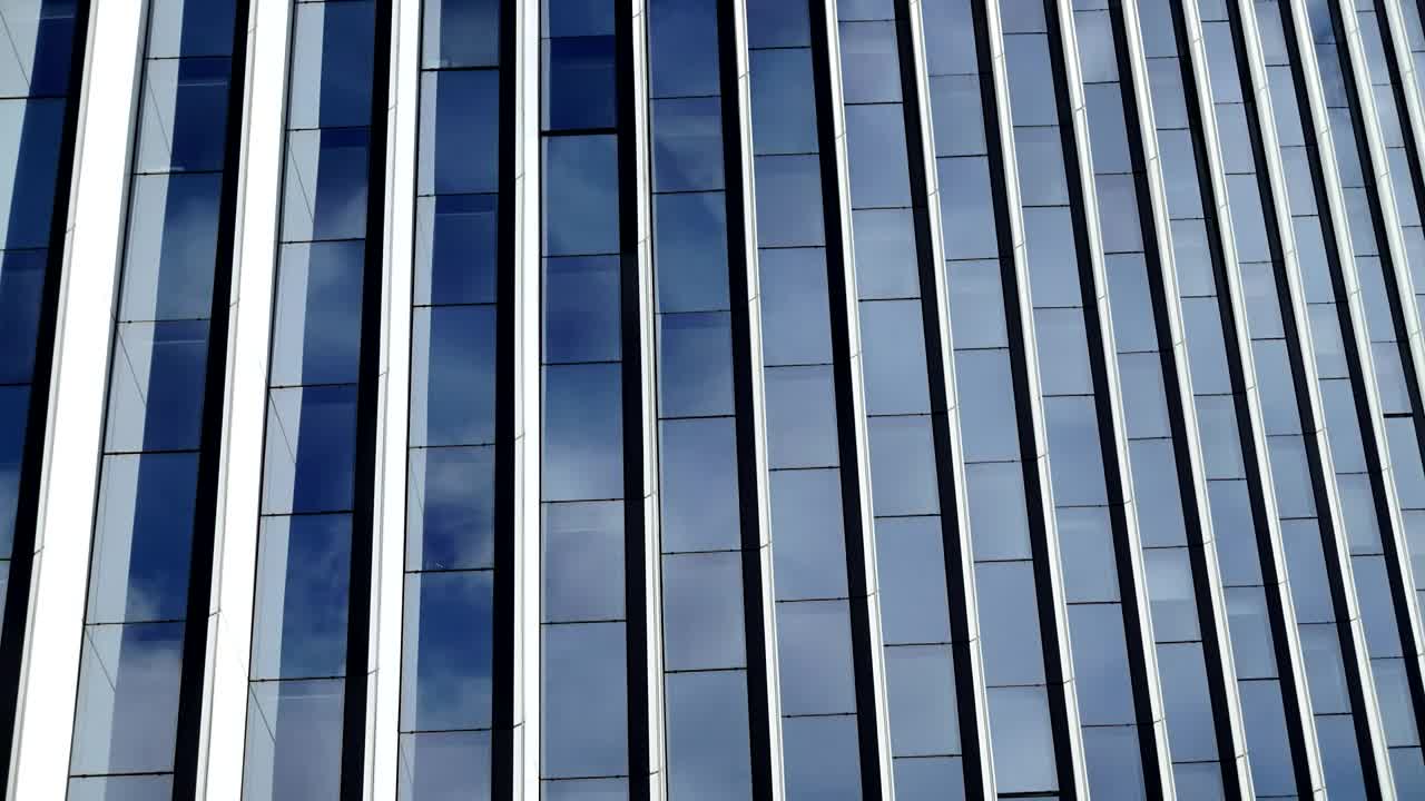 Download Stock Video Clouds Reflecting On A Large Building Live Wallpaper For PC