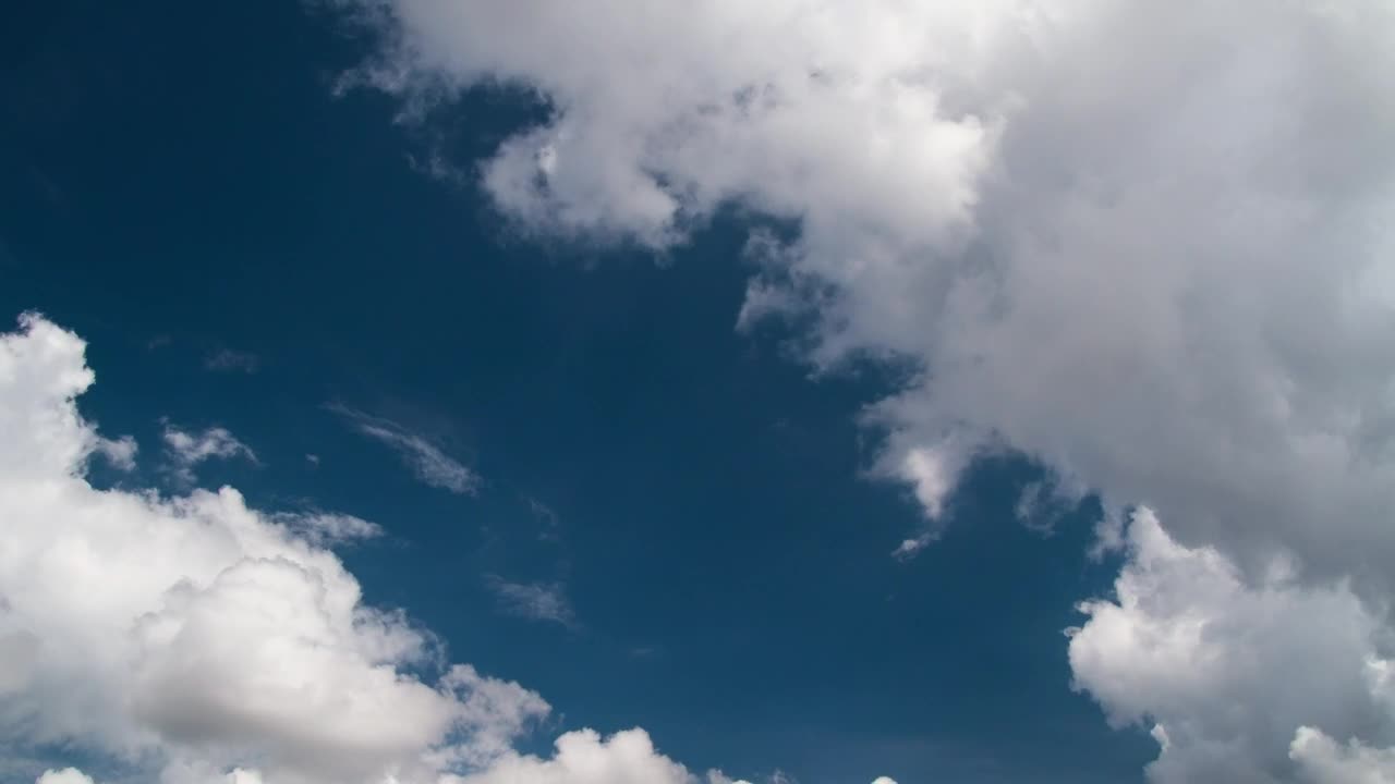 Download Stock Video Clouds Parting To Reveal A Blue Sky Live Wallpaper For PC