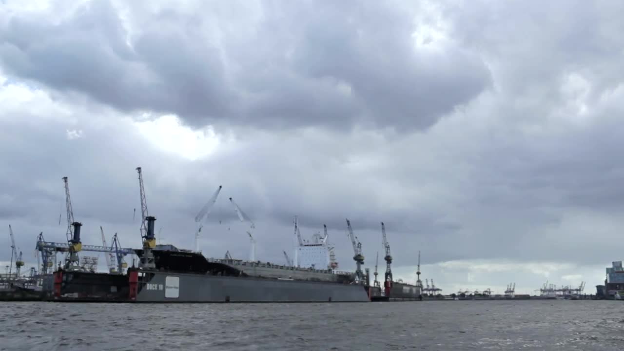 Download Stock Video Clouds Over An Industrial Port Live Wallpaper For PC