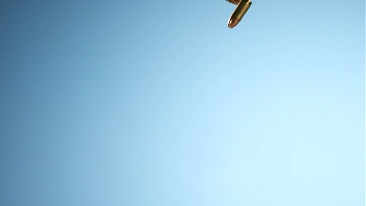 Download Stock Video Falling Bullets With Blue Background Live Wallpaper For PC
