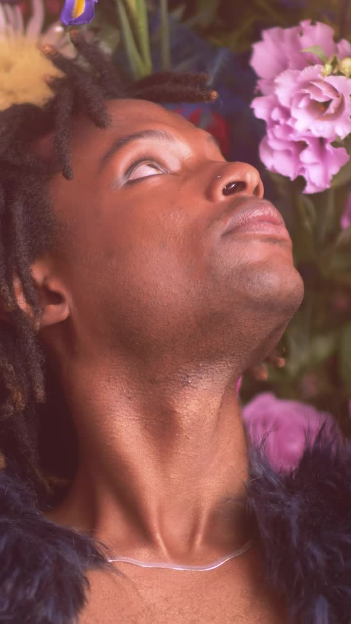 Download Stock Video Face Of An Lgbtq Boy Surrounded By Flowers Live Wallpaper For PC