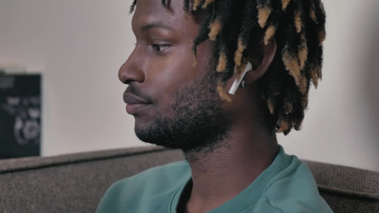 Download Stock Video Face Of A Man Listening To Music While Reading A Live Wallpaper For PC