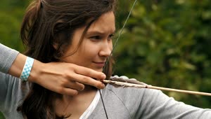 Stock Video Face Of A Female Archer When Shooting An Arrow Live Wallpaper For PC