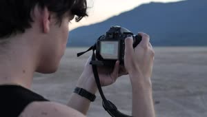 Stock Video Face Of A Boy Taking Pictures In A Desert Live Wallpaper For PC