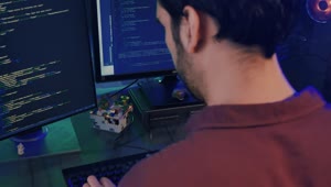 Stock Video Experienced Programmer Working On A Computer Live Wallpaper For PC