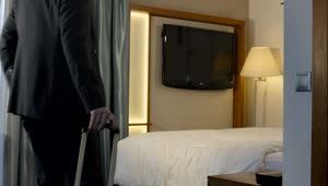 Stock Video Exhausted Businessman Arriving To The Hotel Room Live Wallpaper For PC