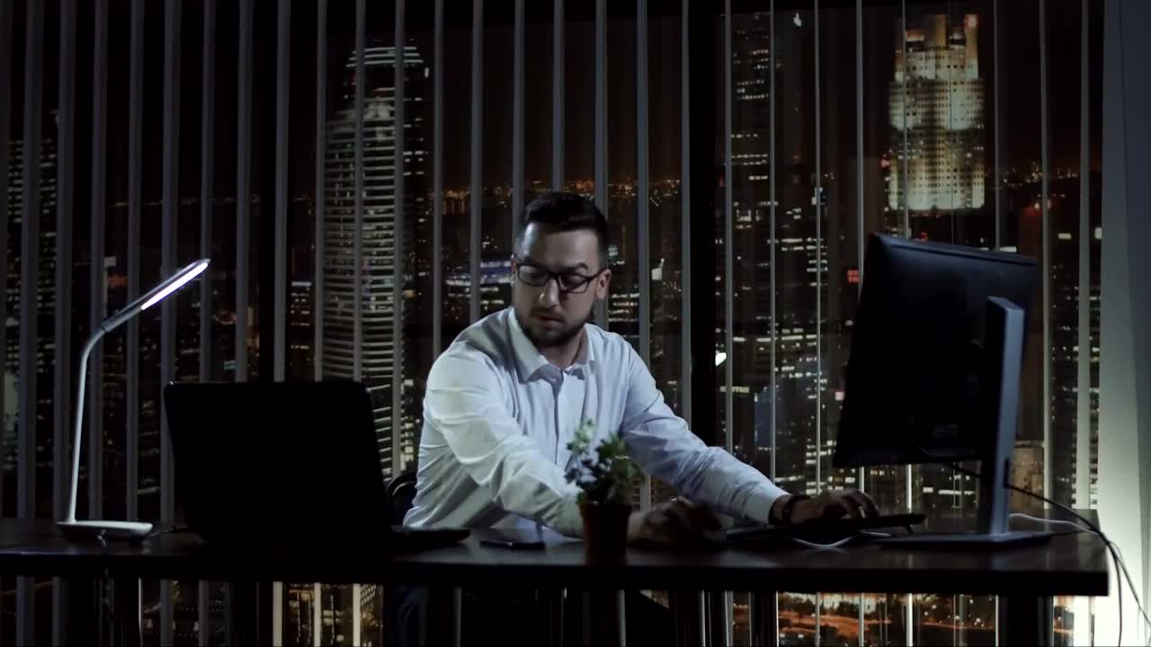 Download Stock Video Excited Man In The Office At Night Live Wallpaper For PC