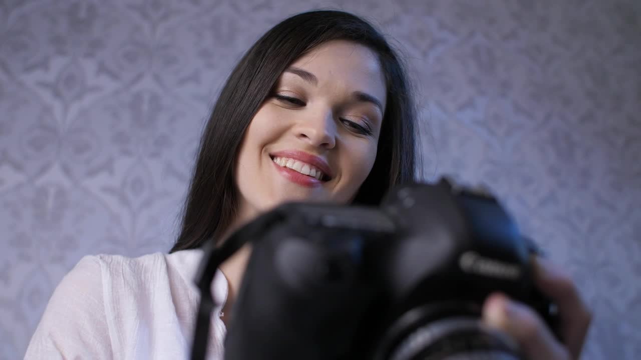 Download Stock Video Excited And Happy Woman Watching Photos Live Wallpaper For PC