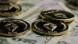 Stock Video Ethereum Golden Coins Over Dollar Bills Live Wallpaper For PC