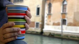 Stock Video Enjoying A Mug Of Tea By The River In Venice Live Wallpaper For PC
