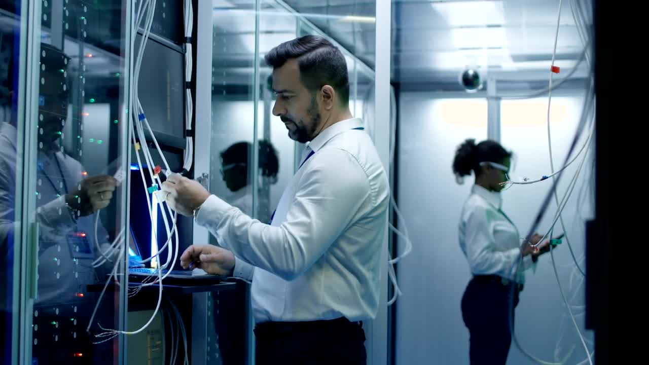 Download Stock Video Engineers Setting Up A Data Center Live Wallpaper For PC