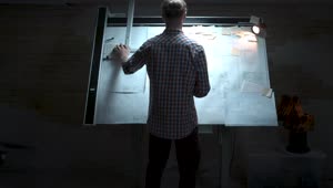Stock Video Engineer Looking Over Plans On A Board Live Wallpaper For PC