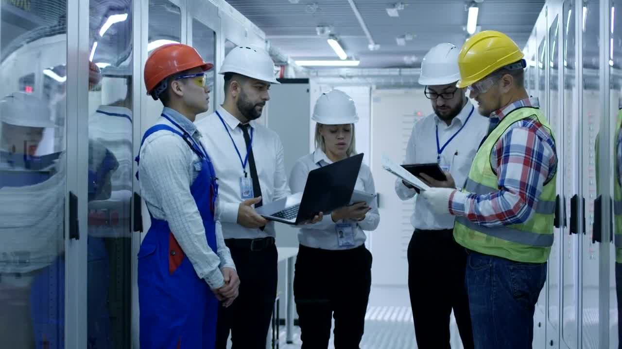 Download Stock Video Electrical Workers In Control Room Live Wallpaper For PC
