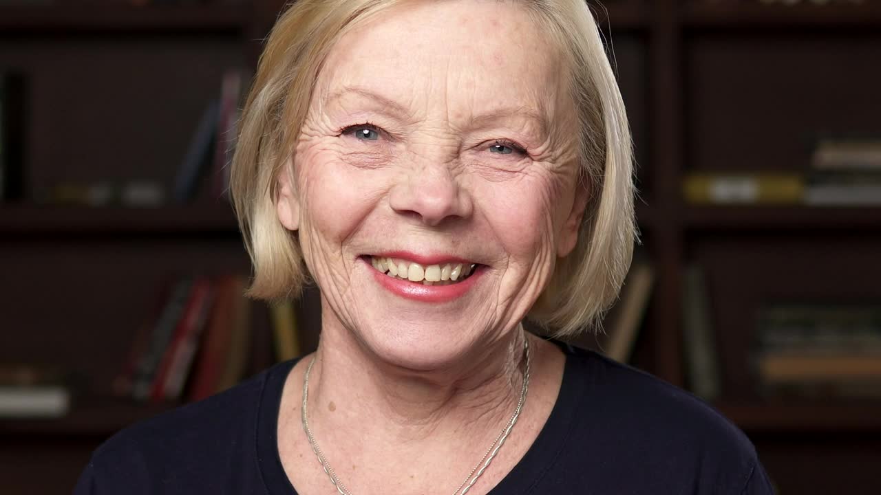 Download Stock Video Elderly Woman Smiling Towards The Camera Live Wallpaper For PC