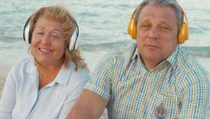Stock Video Elderly Couple Enjoying Music At The Beach Live Wallpaper For PC