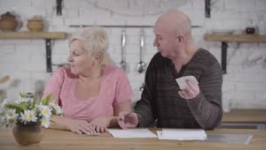 Stock Video Elderly Couple Argue Over Bills Live Wallpaper For PC