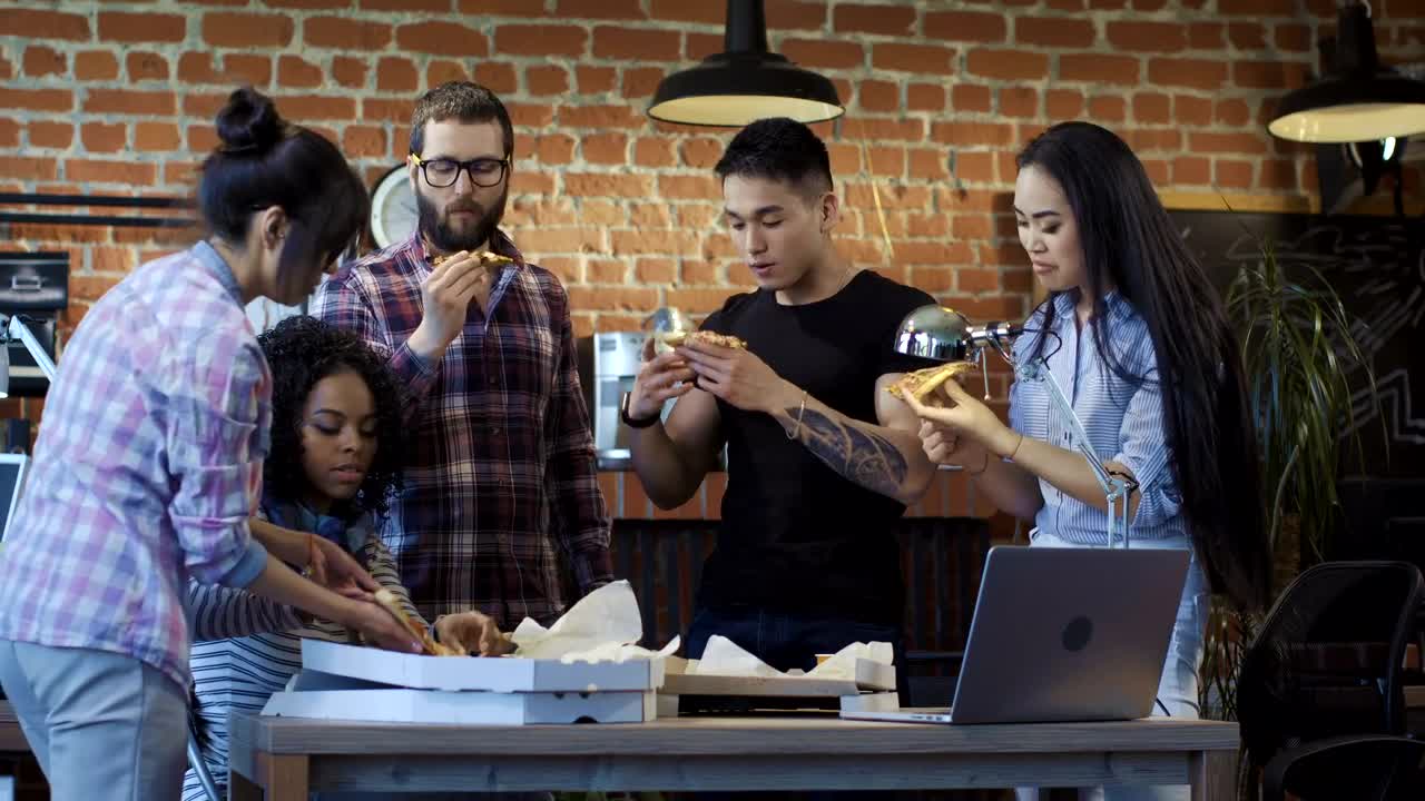 Download Stock Video Eating Pizza Together In The Office Live Wallpaper For PC