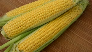 Stock Video Ears Of Corn Turning On A Wooden Surface Live Wallpaper For PC