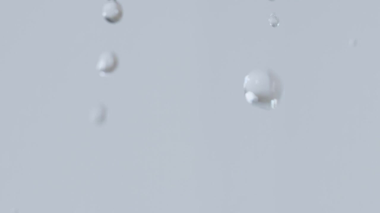 Download Stock Video Drops Of Water Falling On A Gray Background Live Wallpaper For PC