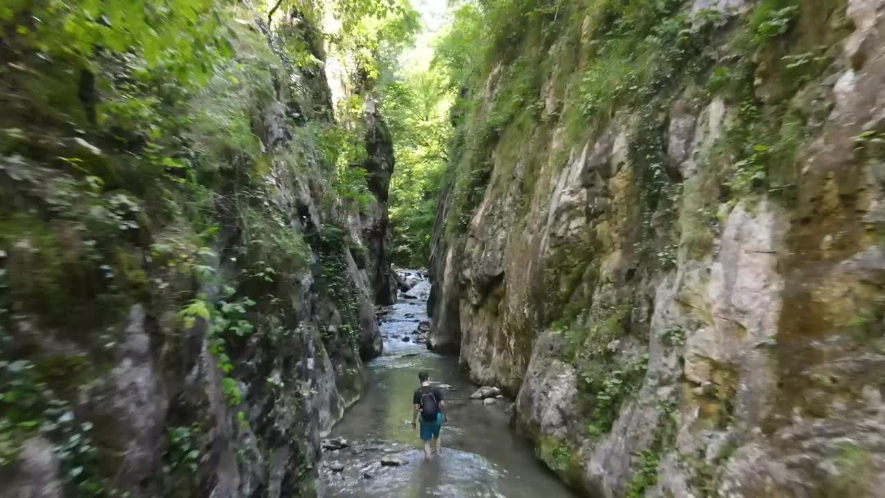 Download Stock Video Drone Tour Above A River Between Two Mountains Live Wallpaper For PC