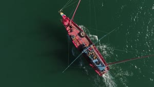 Stock Video Drone Following A Small Red Fishing Boat Live Wallpaper For PC