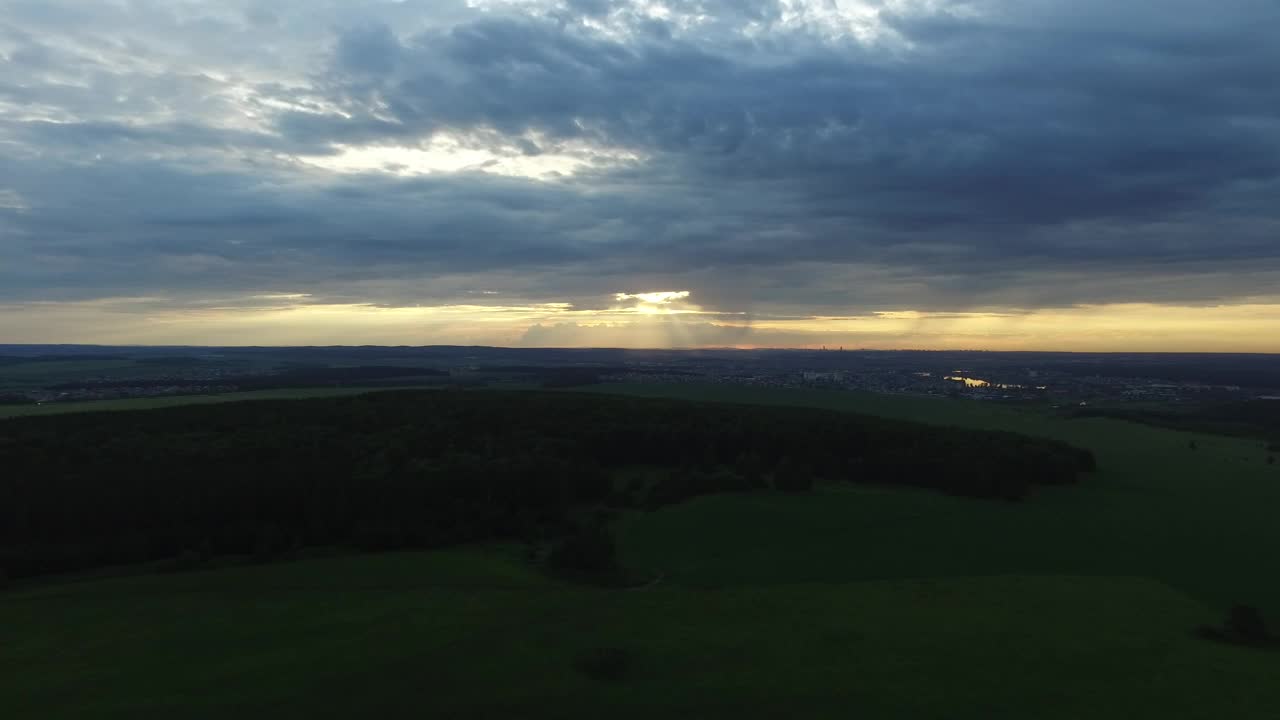 Download Stock Video Drone Flying Over A Field In The Evening Live Wallpaper For PC