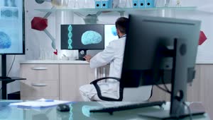 Stock Video Doctor Working On Dna And Brain Models In Lab Live Wallpaper For PC