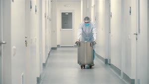 Stock Video Doctor Walking Down A Hospital Hallway Live Wallpaper For PC