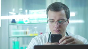 Stock Video Doctor Using A Mobile Phone In The Lab Live Wallpaper For PC