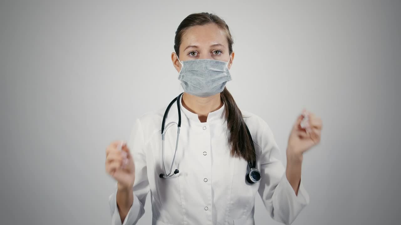 Download Stock Video Doctor Puts Off A Medical Mask Live Wallpaper For PC