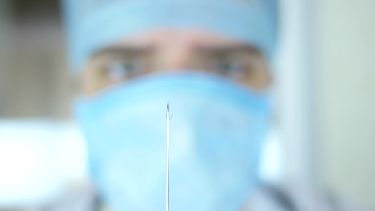 Download Stock Video Doctor Looking At The Syringe Live Wallpaper For PC