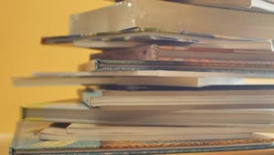 Stock Video Detailed View Of A Disarranged Tower Of Books Live Wallpaper For PC