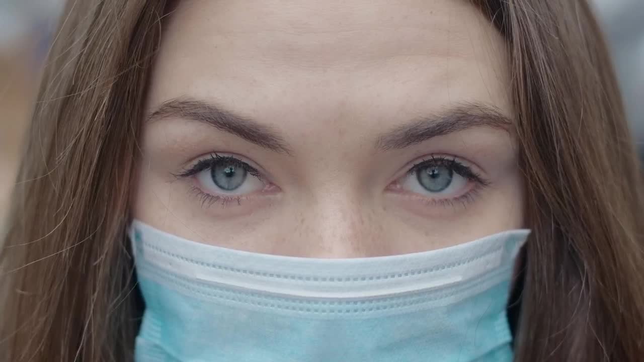 Download Stock Video Detailed Face Of A Girl With A Face Mask Live Wallpaper For PC