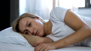 Stock Video Depressed Woman Laying In Bed Live Wallpaper For PC
