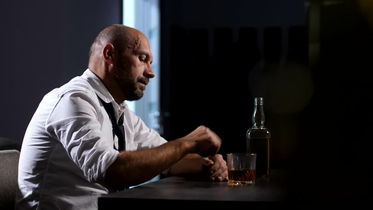 Download Stock Video Depressed Man Holding A Drink Live Wallpaper For PC