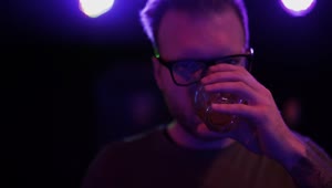 Stock Video Depressed Man Drinking In A Nightclub Live Wallpaper For PC
