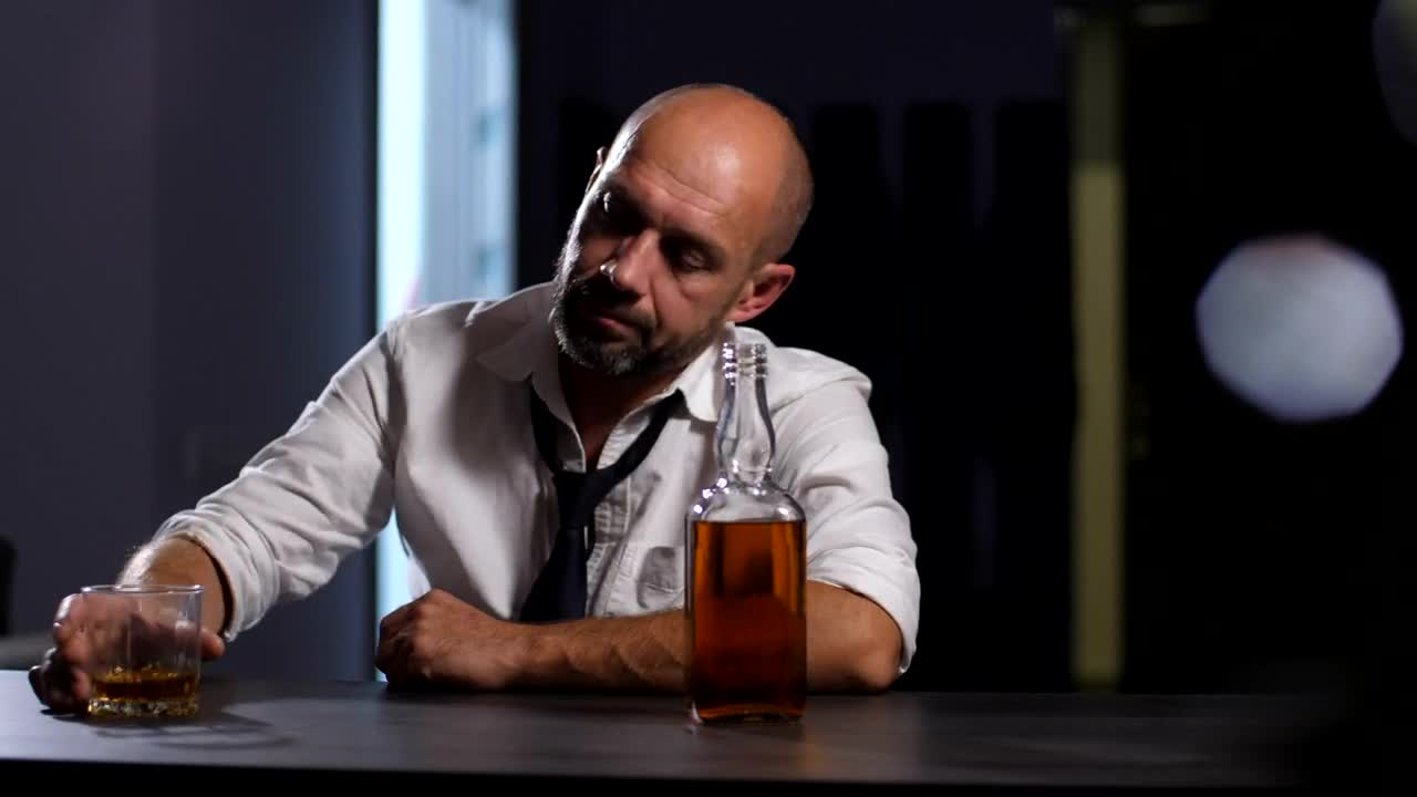 Download Stock Video Depressed Man Drinking At A Bar Live Wallpaper For PC