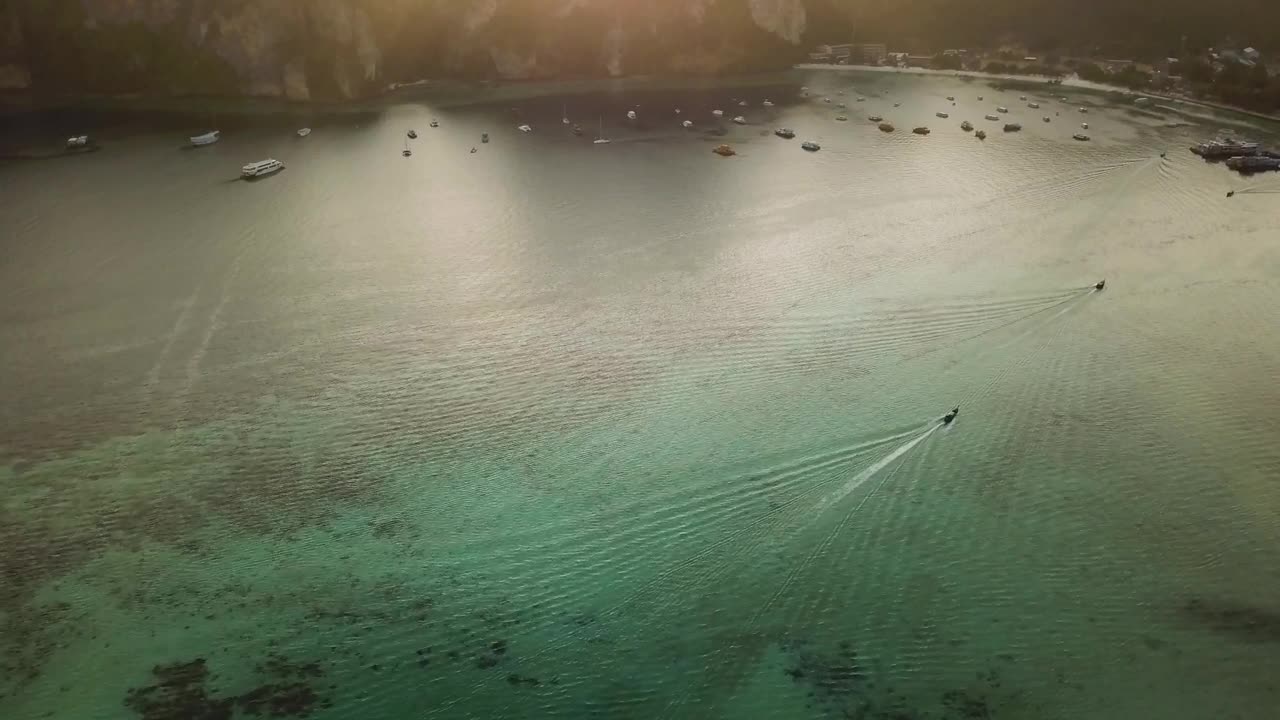 Download Stock Video Flying Over The Clear Sea Of A Coast In A Live Wallpaper For PC