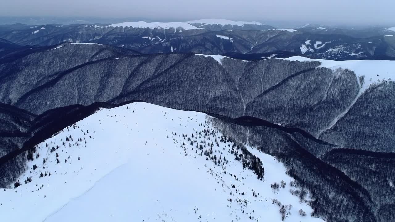 Download Stock Video Flying Over Rocky Mountains In Winter Live Wallpaper For PC