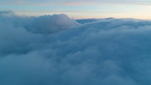 Stock Video Flying Over A Thick Layer Of Clouds In The Sky Live Wallpaper For PC